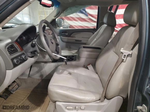 2009 Chevrolet Suburban LT w/2LT with VIN 1GNFK26349R274464, listed as a Copart auction lot 50152055 with 236,997 mi miles and Salvage Title. Bid and sale history available at carsss.com. Image 7.