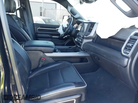 2022 Ram 1500 Laramie with VIN 1C6SRFRT7NN180979, listed as a IAAI auction lot 41824340 with 32,446 mi miles and . Bid and sale history available at DreamBid. Image 5.