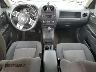 2015 Jeep Patriot Latitude with VIN 1C4NJRFB8FD366581, listed as a Copart auction lot 56221585 with 171,009 mi miles and Salvage title. Bid and sale history available at DreamBid. Image 8.