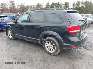2013 Dodge Journey SXT with VIN 3C4PDDBG2DT507690, listed as a IAAI auction lot 41793988 with 211,110 mi miles and . Bid and sale history available at DreamBid. Image 3.