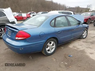 2004 Ford Taurus SE with VIN 1FAFP53U74A140294, listed as a IAAI auction lot 41630953 with Not Provided miles and . Bid and sale history available at DreamBid. Image 4.