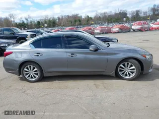 2016 Infiniti Q50 3.0t Premium with VIN JN1EV7AR7GM345514, listed as a IAAI auction lot 42064465 with 107,935 mi miles. Bid and sale history available at carsss.com. Image 13.