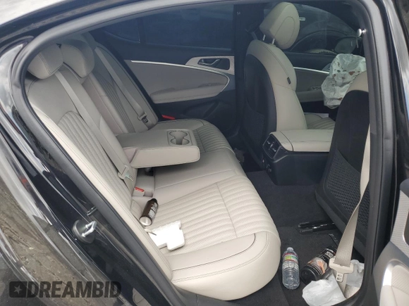 2023 Genesis G70 2.0T with VIN KMTG34TA2PU126768, listed as a Copart auction lot 56201094 with 11,556 mi miles and Salvage Title. Bid and sale history available at DreamBid. Image 10.