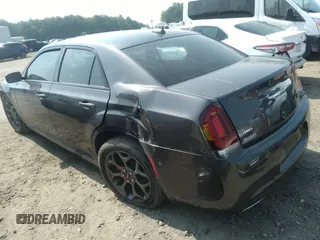 2018 Chrysler 300 with VIN 2C3CCAGG9JH256295, listed as a IAAI auction lot 36763252 with 131,711 mi miles. Bid and sale history available at carsss.com. Image 3.