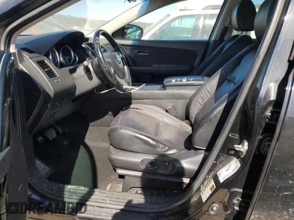 2015 Mazda CX-9 Touring z VIN JM3TB2CA5F0455109, wystawiony jako Copart lot #46899815 z przebiegiem 131 847 mil mil oraz Szkoda całkowita • Salvage title. Historia ofert i sprzedaży dostępna na DreamBid. Obrazek 7.