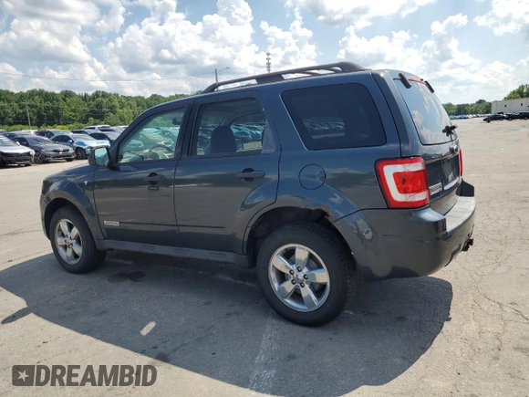 2008 Ford Escape XLT with VIN 1FMCU03178KA55787, listed as a Copart auction lot 64784465 with 2,235,503 mi miles and Clean title. Bid and sale history available at DreamBid. Image 2.