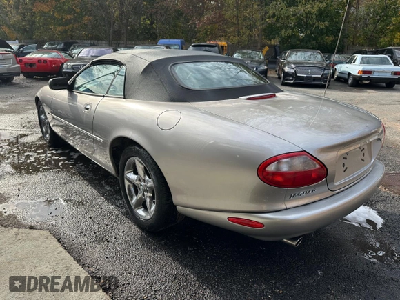 1999 Jaguar XK z VIN SAJGX2048XC041933, wystawiony jako Copart lot #44338125 z przebiegiem 67 133 mil mil oraz Tytuł czysty. Historia ofert i sprzedaży dostępna na DreamBid. Obrazek 3.