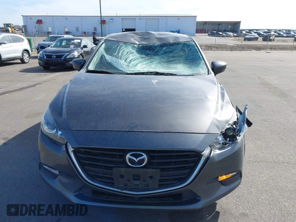 2018 Mazda 3 Sport with VIN 3MZBN1U76JM183441, listed as a IAAI auction lot 41858227 with 123,899 mi miles and . Bid and sale history available at DreamBid. Image 12.