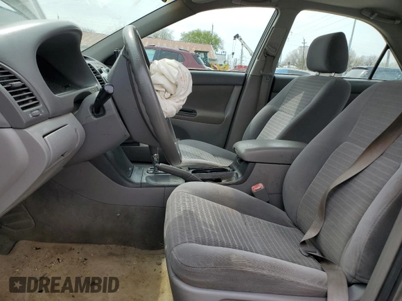 2006 Toyota Camry STD z VIN 4T1BE32K16U725548, wystawiony jako Copart lot #52083245 z przebiegiem Nie podano mil oraz Szkoda całkowita • Salvage title. Historia ofert i sprzedaży dostępna na DreamBid. Obrazek 7.