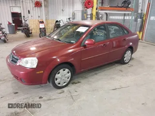 2007 Suzuki Forenza z VIN KL5JD56Z47K599789, wystawiony jako IAAI lot #41747725 z przebiegiem 145 029 mil mil oraz . Historia ofert i sprzedaży dostępna na DreamBid. Obrazek 2.