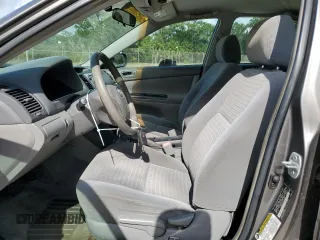 2006 Toyota Camry STD z VIN 4T1BE32K36U699650, wystawiony jako Copart lot #61942095 z przebiegiem 194 810 mil mil oraz Czysty tytuł • Clean title. Historia ofert i sprzedaży dostępna na DreamBid. Obrazek 7.