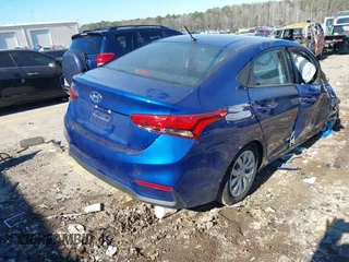 2022 Hyundai Accent SE with VIN 3KPC24A6XNE157129, listed as a IAAI auction lot 41317543 with 123,000 mi miles. Bid and sale history available at carsss.com. Image 4.