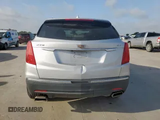 2018 Cadillac XT5 Luxury FWD with VIN 1GYKNCRS2JZ208016, listed as a Copart auction lot 61551285 with 145,019 mi miles and Salvage title. Bid and sale history available at DreamBid. Image 6.