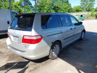 2005 Honda Odyssey LX z VIN 5FNRL38275B117069, wystawiony jako IAAI lot #42232470 z przebiegiem 265 180 mil mil oraz . Historia ofert i sprzedaży dostępna na DreamBid. Obrazek 4.