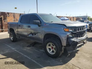 2021 Chevrolet Silverado 1500 Custom Trail Boss with VIN 1GCPYCEF5MZ430436, listed as a Copart auction lot 52027245 with 60,656 mi miles and Salvage Title. Bid and sale history available at DreamBid. Image 4.