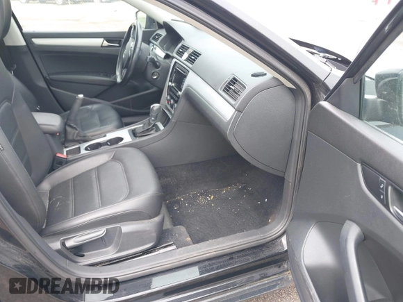 2013 Volkswagen Passat SE with VIN 1VWBP7A31DC017929, listed as a IAAI auction lot 42174320 with 169,596 mi miles and . Bid and sale history available at DreamBid. Image 5.