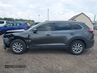 2016 Mazda CX-9 Sport z VIN JM3TCABYXG0126543, wystawiony jako IAAI lot #42256448 z przebiegiem 133 813 mil mil oraz . Historia ofert i sprzedaży dostępna na DreamBid. Obrazek 14.