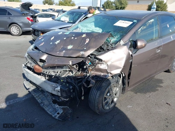 2016 Toyota Prius v Two with VIN JTDZN3EU0GJ042775, listed as a IAAI auction lot 41283162 with 220,882 mi miles. Bid and sale history available at carsss.com. Image 6.