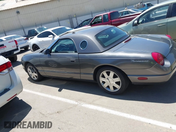 2003 Ford Thunderbird Deluxe z VIN 1FAHP60AX3Y109880, wystawiony jako IAAI lot #42336922 z przebiegiem 213 477 mil mil oraz . Historia ofert i sprzedaży dostępna na DreamBid. Obrazek 14.