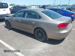 2015 Volkswagen Passat SE с VIN 1VWBV7A39FC067485, выставлен на аукционе IAAI как лот 42228324 с пробегом 147 214 миль миль и . История ставок и продаж доступна на DreamBid. Изображение 3.
