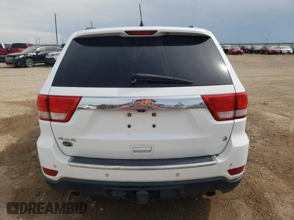 2013 Jeep Grand Cherokee Overland with VIN 1C4RJFCT2DC650336, listed as a Copart auction lot 55455105 with 129,858 mi miles and Clean Title. Bid and sale history available at carsss.com. Image 6.
