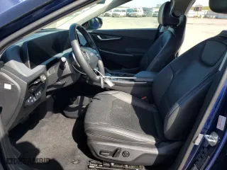2023 Kia EV6 Wind with VIN KNDC34LA7P5150409, listed as a Copart auction lot 52458975 with 59,445 mi miles and Clean Title. Bid and sale history available at carsss.com. Image 7.