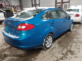 2013 Ford Fiesta SE z VIN 3FADP4BJ7DM225471, wystawiony jako IAAI lot #41625556 z przebiegiem 70 948 mil mil oraz . Historia ofert i sprzedaży dostępna na DreamBid. Obrazek 4.