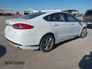 2018 Ford Fusion SE with VIN 3FA6P0H71JR262575, listed as a IAAI auction lot 41408259 with 96,624 mi miles and . Bid and sale history available at DreamBid. Image 4.