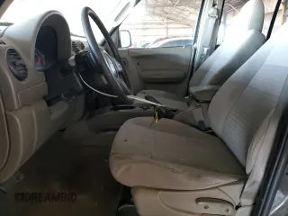 2005 Jeep Liberty Sport with VIN 1J4GK48K45W664323, listed as a Copart auction lot 53851855 with 323,695 mi miles and Salvage Title. Bid and sale history available at DreamBid. Image 7.