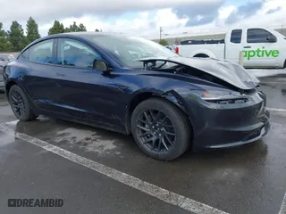 2025 Tesla Model 3 Long Range with VIN 5YJ3E1EB4SF874936, listed as a IAAI auction lot 41157464 with NaN miles. Bid and sale history available at carsss.com. Image 1.