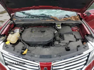 2015 Lincoln MKC z VIN 5LMTJ2AHXFUJ10820, wystawiony jako Copart lot #57139315 z przebiegiem 128 714 mil mil oraz Szkody całkowita. Historia ofert i sprzedaży dostępna na DreamBid. Obrazek 12.