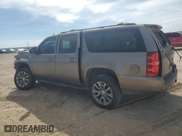 2014 Chevrolet Suburban LT with VIN 1GNSCJE01ER226363, listed as a Copart auction lot 50534915 with 185,731 mi miles and Salvage Title. Bid and sale history available at carsss.com. Image 2.