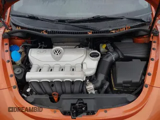 2010 Volkswagen New Beetle Coupe with VIN 3VWRG3AG3AM024689, listed as a IAAI auction lot 41037756 with 102,180 mi miles. Bid and sale history available at carsss.com. Image 10.