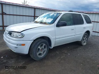 2003 Oldsmobile Bravada z VIN 1GHDT13SX32348743, wystawiony jako IAAI lot #42281014 z przebiegiem 213 536 mil mil oraz . Historia ofert i sprzedaży dostępna na DreamBid. Obrazek 2.