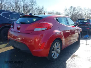 2016 Hyundai Veloster z VIN KMHTC6AD1GU260219, wystawiony jako IAAI lot #41114806 z przebiegiem 128 000 mil mil oraz . Historia ofert i sprzedaży dostępna na DreamBid. Obrazek 4.