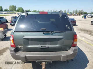 2002 Jeep Grand Cherokee Laredo with VIN 1J4GW48S02C174656, listed as a Copart auction lot 56954155 with 235,427 mi miles and Salvage title. Bid and sale history available at DreamBid. Image 6.