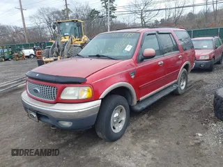 1999 Ford Expedition XLT z VIN 1FMPU18L7XLC51478, wystawiony jako IAAI lot #41679788 z przebiegiem Nie podano mil oraz . Historia ofert i sprzedaży dostępna na DreamBid. Obrazek 2.
