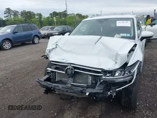 2022 Volkswagen Tiguan SE z VIN 3VV2B7AX8NM109450, wystawiony jako IAAI lot #42248707 z przebiegiem 18 603 mil mil oraz . Historia ofert i sprzedaży dostępna na DreamBid. Obrazek 12.