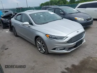2017 Ford Fusion Hybrid Titanium with VIN 3FA6P0RU5HR181755, listed as a IAAI auction lot 42704832 with 152,688 mi miles and . Bid and sale history available at DreamBid. Image 1.