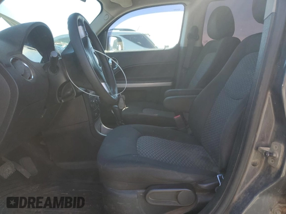 2009 Chevrolet HHR LS with VIN 3GNCA13B69S635654, listed as a Copart auction lot 50254175 with 133,545 mi miles and Salvage Title. Bid and sale history available at DreamBid. Image 7.