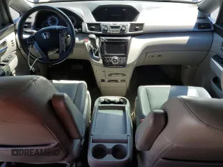 2014 Honda Odyssey Touring with VIN 5FNRL5H96EB068651, listed as a Copart auction lot 51649735 with 157,213 mi miles and Salvage title. Bid and sale history available at DreamBid. Image 8.
