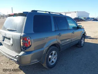 2008 Honda Pilot EX-L with VIN 5FNYF28518B006058, listed as a IAAI auction lot 41425424 with 230,006 mi miles. Bid and sale history available at carsss.com. Image 4.
