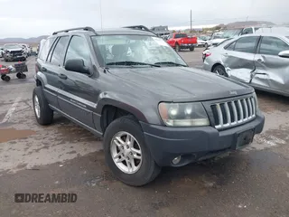 2004 Jeep Grand Cherokee Laredo z VIN 1J4GW48S94C380187, wystawiony jako IAAI lot #41933757 z przebiegiem 227 651 mil mil oraz . Historia ofert i sprzedaży dostępna na DreamBid. Obrazek 1.