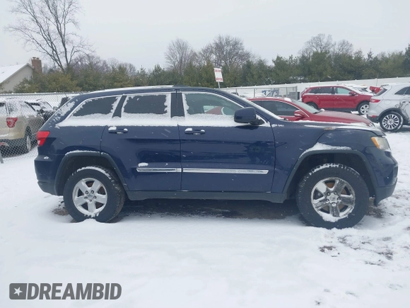 2013 Jeep Grand Cherokee Laredo with VIN 1C4RJFAGXDC542987, listed as a IAAI auction lot 41262770 with 199,273 mi miles. Bid and sale history available at carsss.com. Image 12.