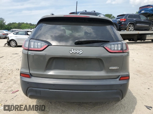 2020 Jeep Cherokee Latitude Plus with VIN 1C4PJLLB0LD653676, listed as a Copart auction lot 55921075 with 98,997 mi miles and Salvage title. Bid and sale history available at DreamBid. Image 6.