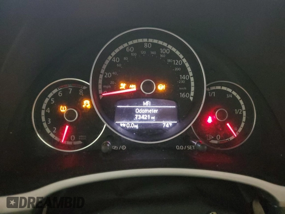 2015 Volkswagen Beetle with VIN 3VW7S7AT1FM822318, listed as a Copart auction lot 71398644 with 73,421 mi miles and Salvage Title. Bid and sale history available at DreamBid. Image 9.