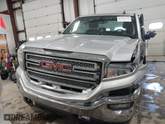2018 GMC Sierra 1500 SLE z VIN 1GTV2MEH8JZ357073, wystawiony jako IAAI lot #41642234 z przebiegiem 105 007 mil mil oraz . Historia ofert i sprzedaży dostępna na DreamBid. Obrazek 12.