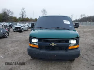 2014 Chevrolet Express Cargo Van with VIN 1GCWGGCAXE1198199, listed as a IAAI auction lot 41242821 with 274,446 mi miles. Bid and sale history available at carsss.com. Image 12.