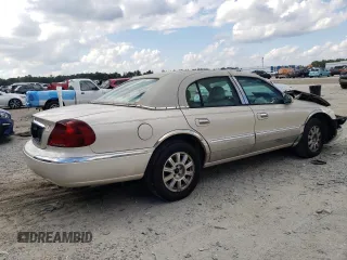 2001 Lincoln Continental with VIN 1LNHM97V01Y649261, listed as a Copart auction lot 44756395 with 141,648 mi miles and Salvage Title. Bid and sale history available at carsss.com. Image 3.