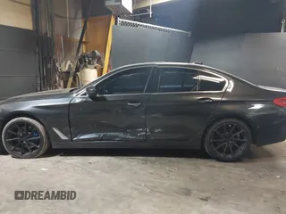 2017 BMW 5 Series 530i xDrive with VIN WBAJA7C35HG905401, listed as a IAAI auction lot 38089618 with 107,692 mi miles and . Bid and sale history available at carsss.com. Image 14.